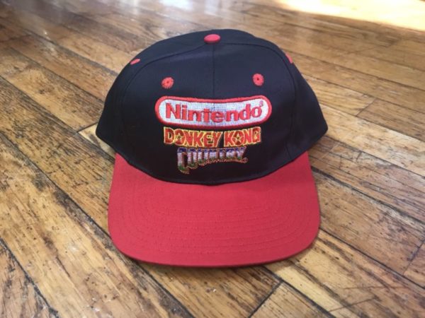 Remember 1994 when Donkey Kong Country saved the Super Nintendo with graphcs that gamers have never seen before? Show your appreciation for this game with this Vintage Donkey Kong Country Snapback hat on wooden floor